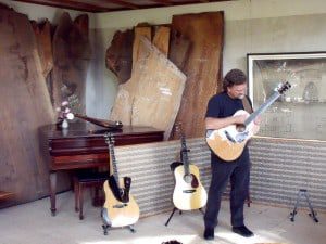 Tim Farrell playing the guitar