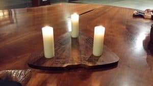 Mira created a special holder for three candles which was inscribed for each venue.