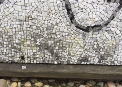 Ben Shahn mosaic damage. Mildew from the rot wood has migrated to the tiles.
