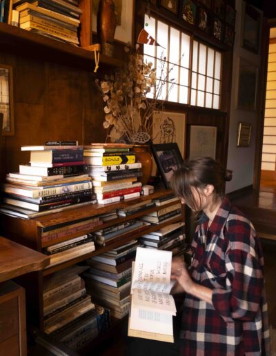 Lauren Griffin, Assistant Archivist, with library collection
