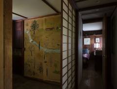 Interior hallway and mural painted by Mira. Photo by Elizabeth Felicella, 2020